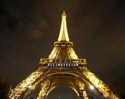 In Christmas season, Paris is aglow but uneasy