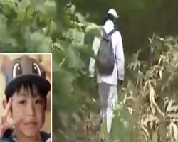 Japan rescuers expand forest search for missing boy